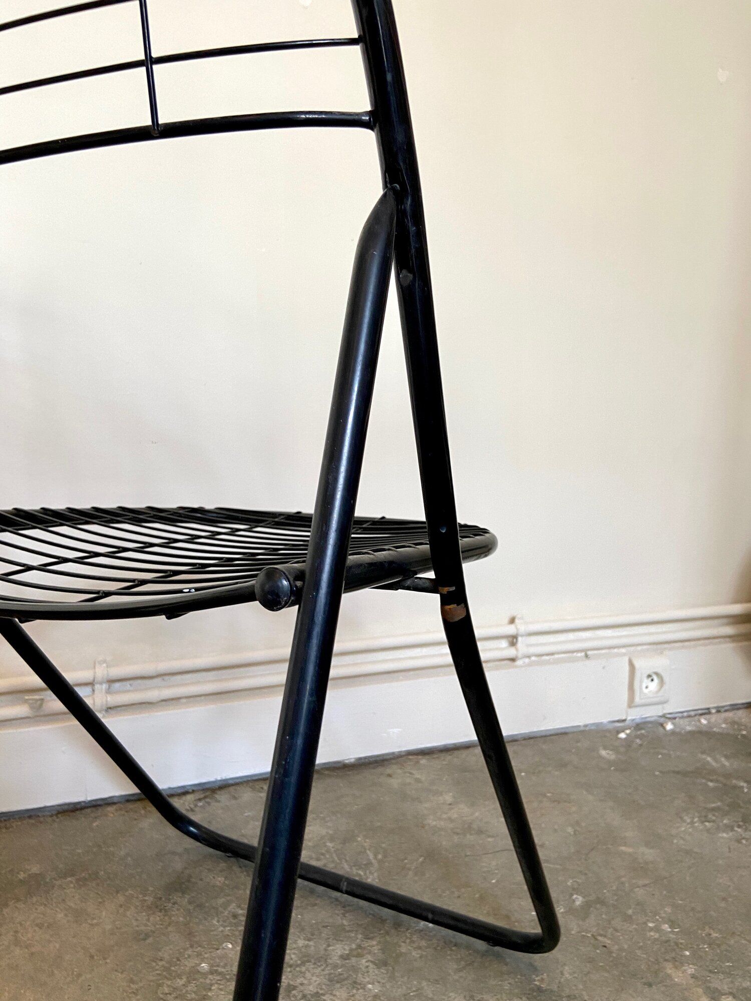 Black metal folding chair