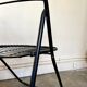 Black metal folding chair
