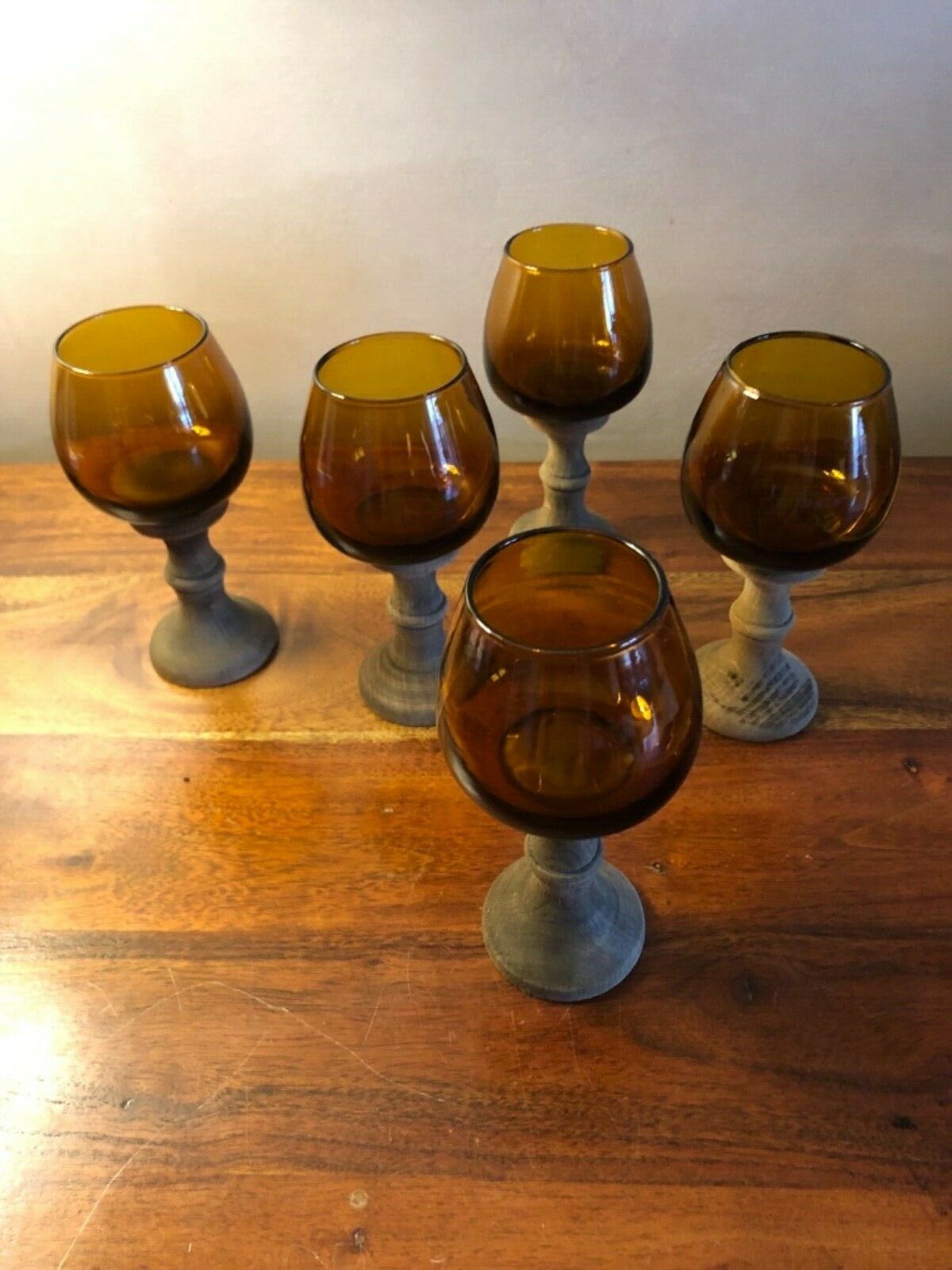 Lot of 5 walking glasses made of wood and vintage amber glass