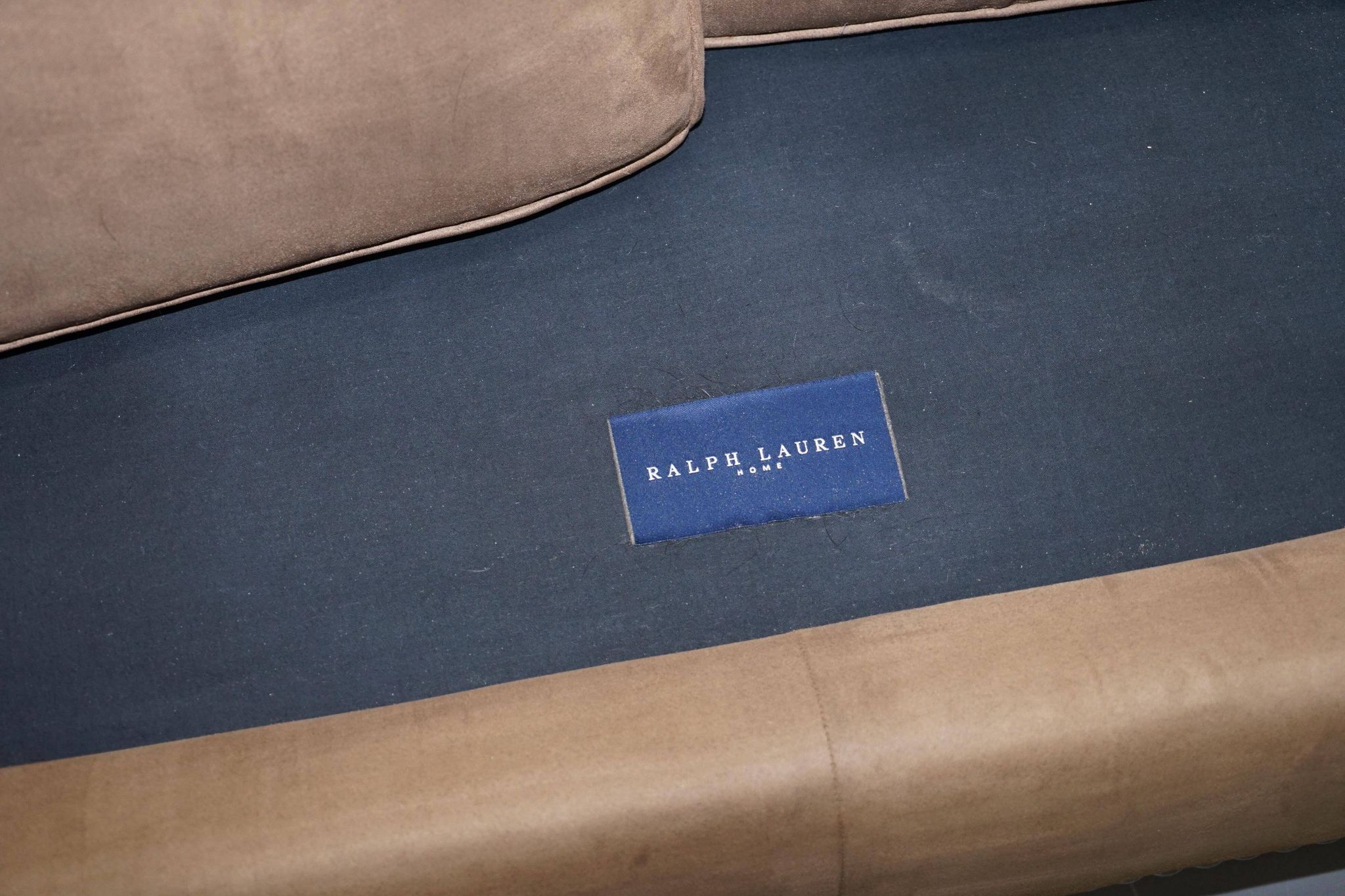 Ralph Lauren Jamaica velvet sofa pair with feather cushions.