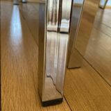 Pair of brown low chairs with chrome base