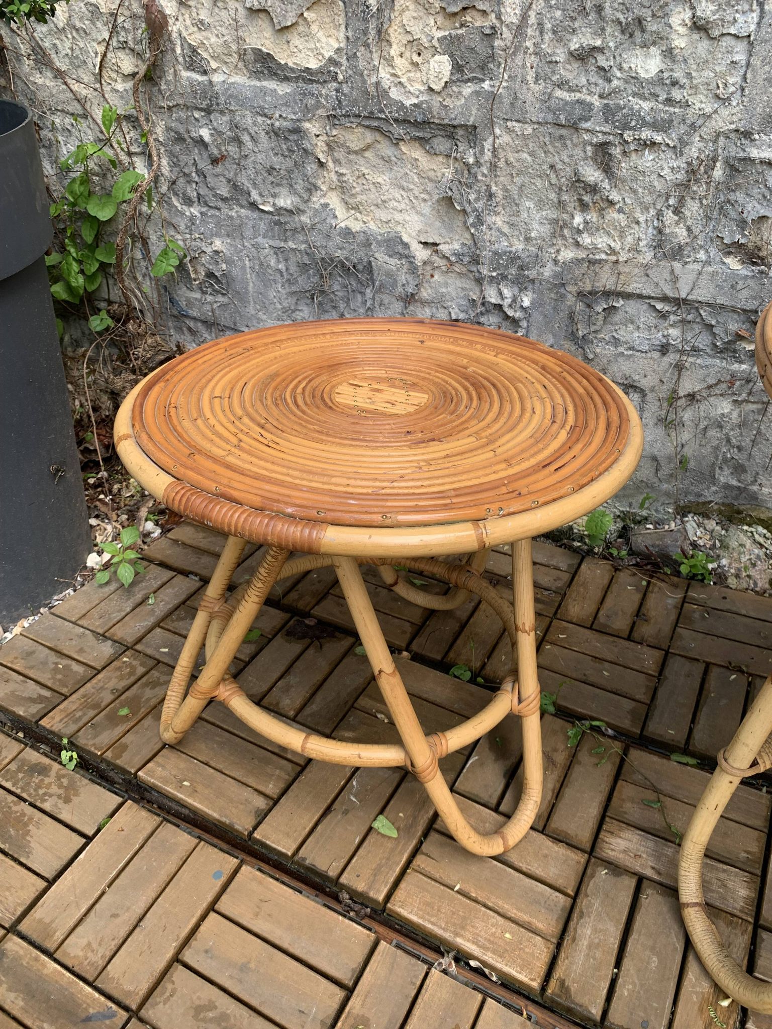 Pair of tripod coffee tables in rattan from the 1950s.