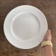 Set of large round white earthenware dishes from Creil and Montereau, 19th century