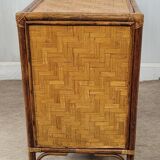 Chest of drawers made of wood, rattan and bamboo.