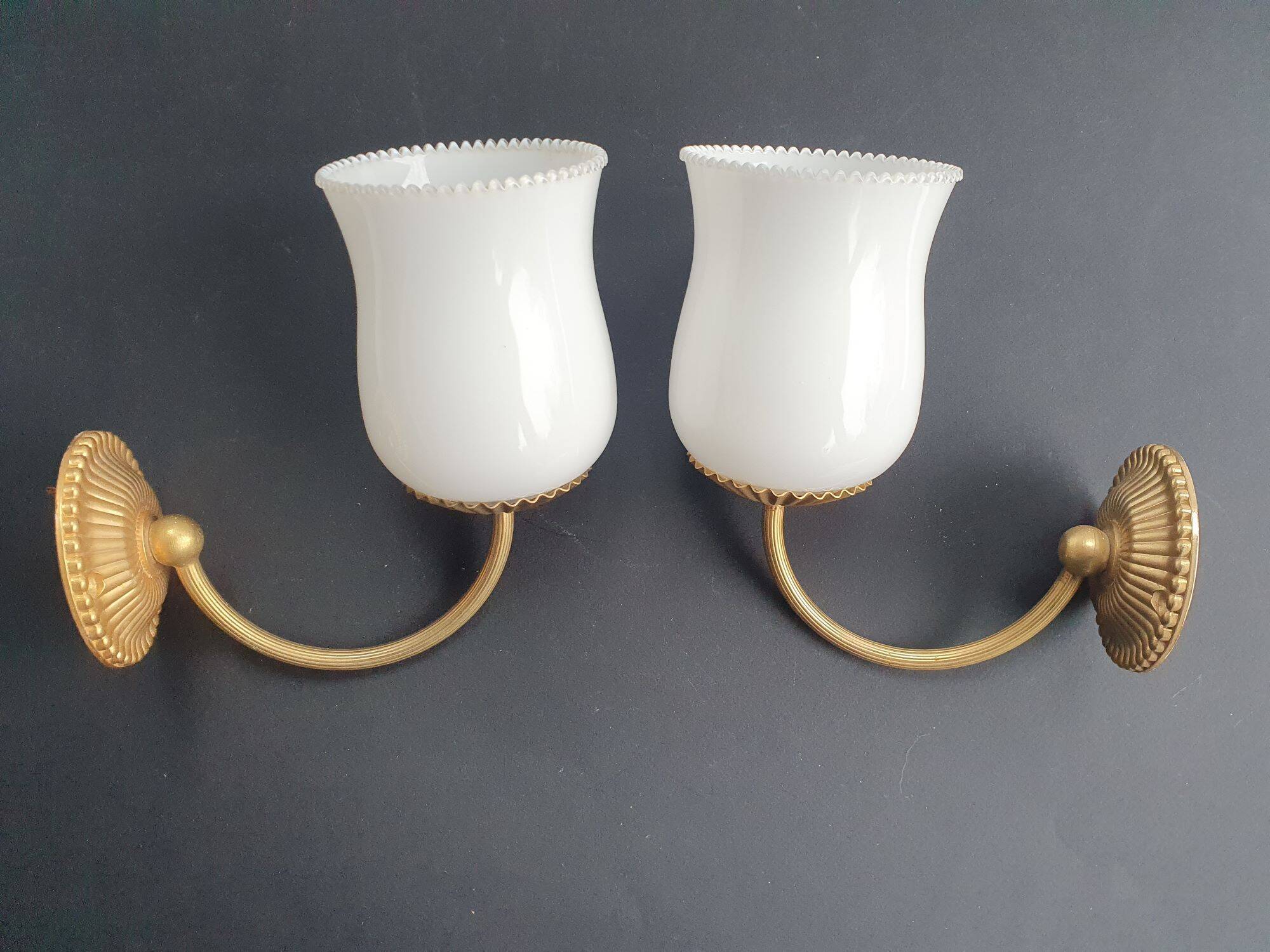 Pair of vintage gold-tone wall sconces with opaline glass globes