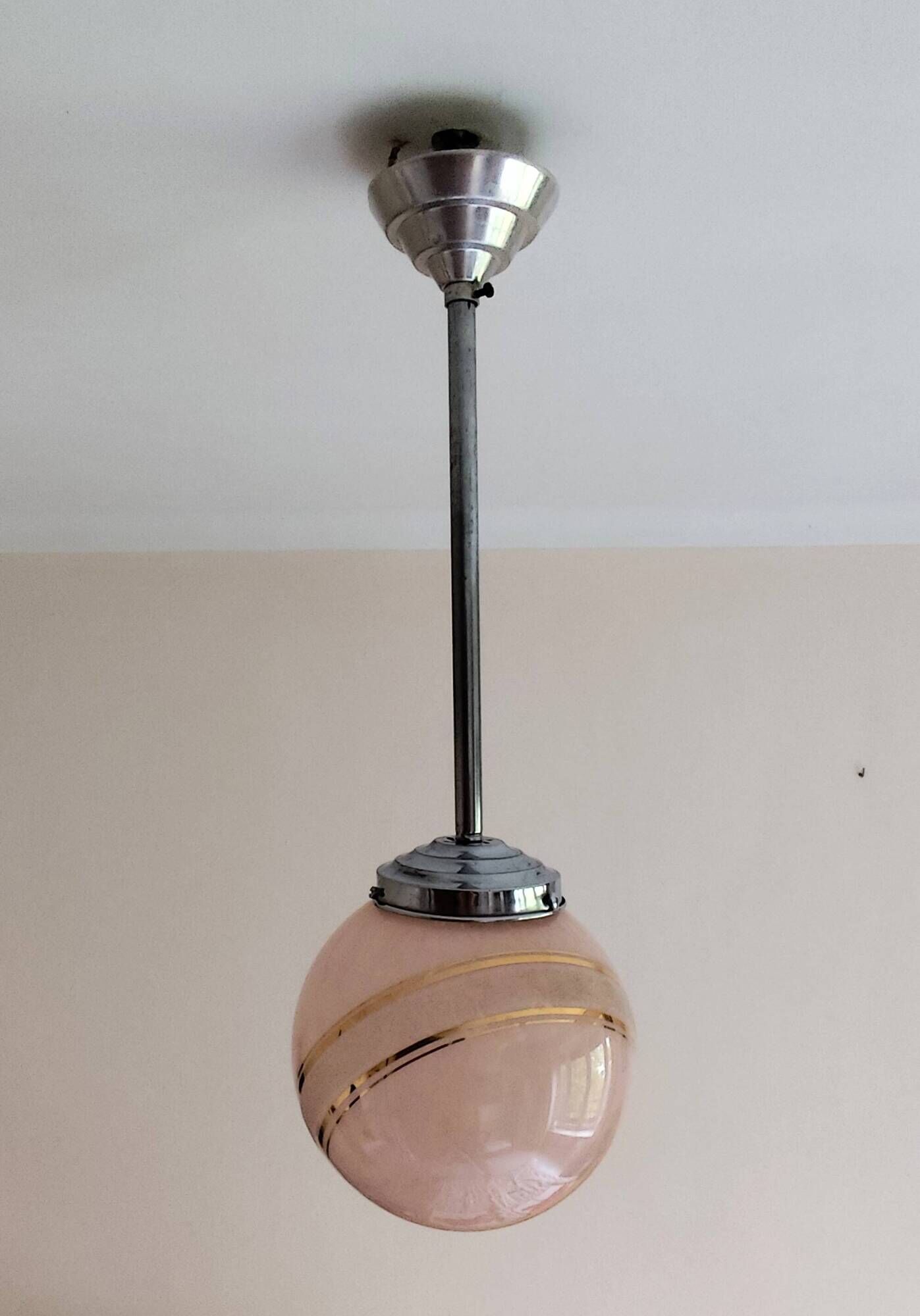 suspension glass globe pink and gold on a metal aluminium stem and structure