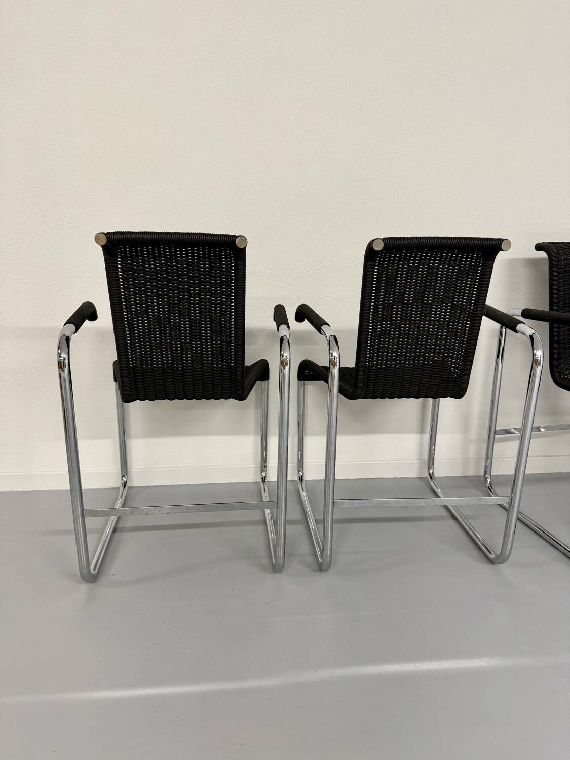 6 black tubular chairs design by Axel Bruchhäuser model D20 bauhaus