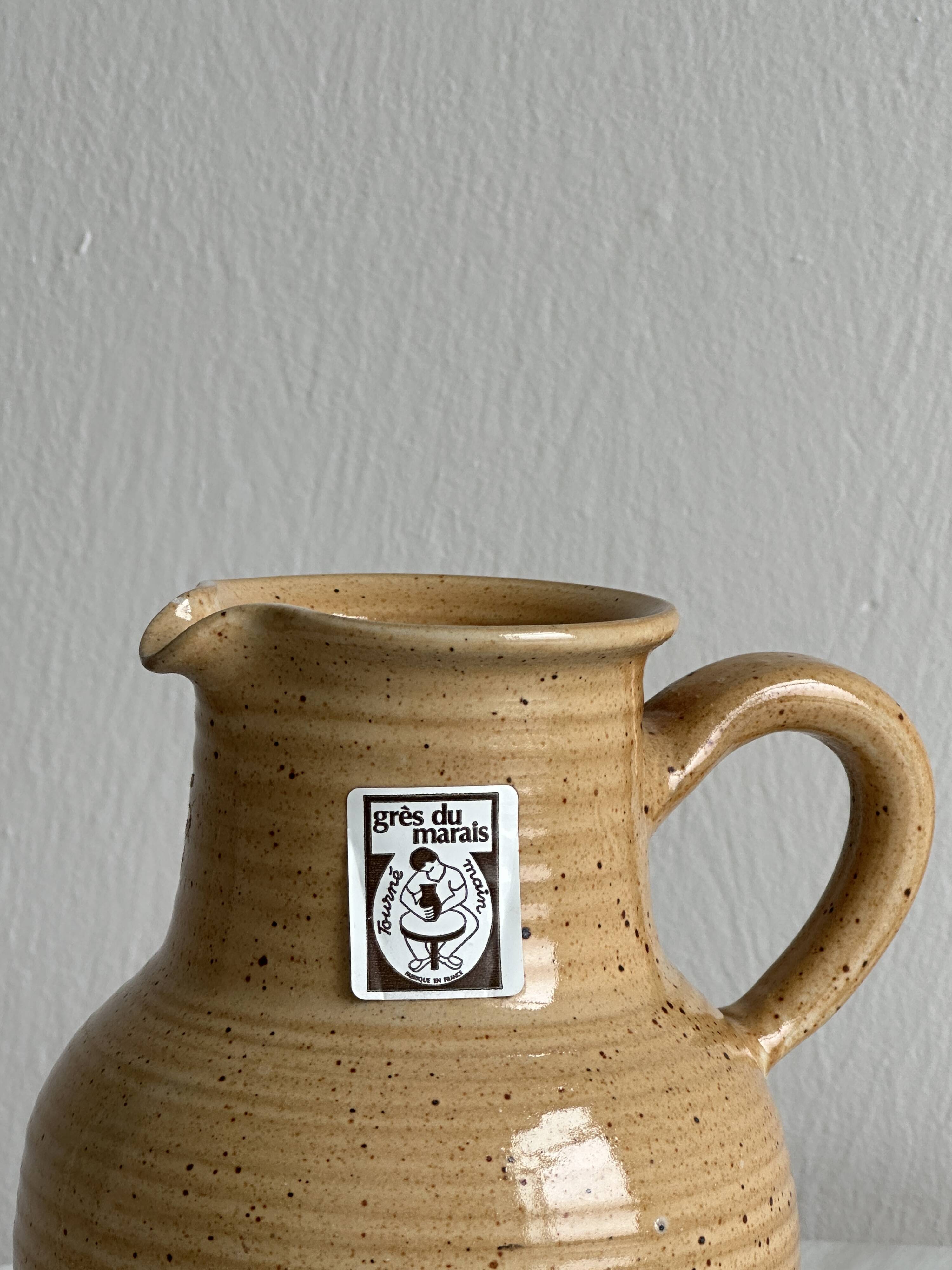 Hand-thrown ceramic pitcher