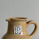 Hand-thrown ceramic pitcher