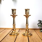 Pair of candle holders in solid gilded metal