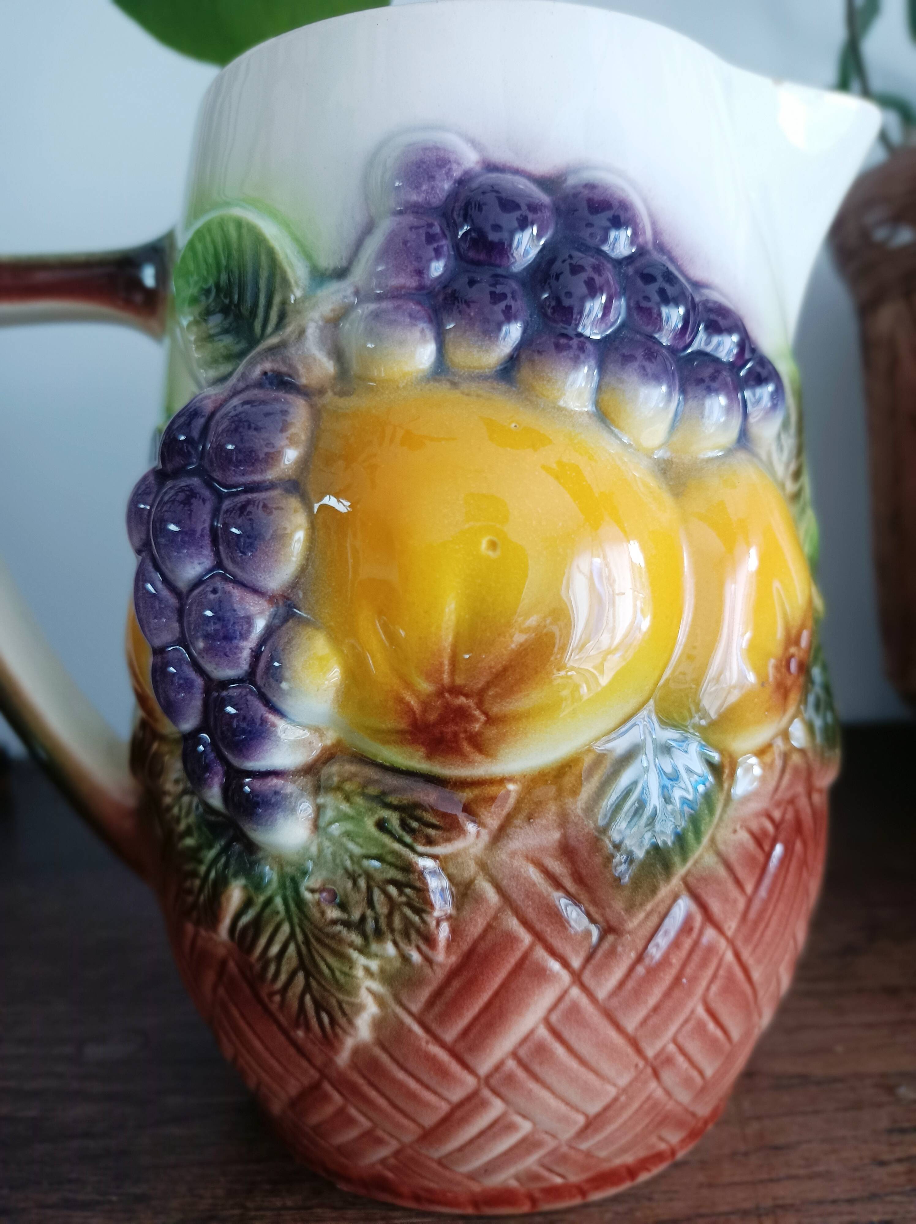 St-Clément pitcher in slip, fruit decoration