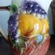 St-Clément pitcher in slip, fruit decoration