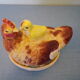 Empty pocket in the shape of a painted ceramic hen
