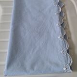 Embroidered drapery and baby's bed adornment