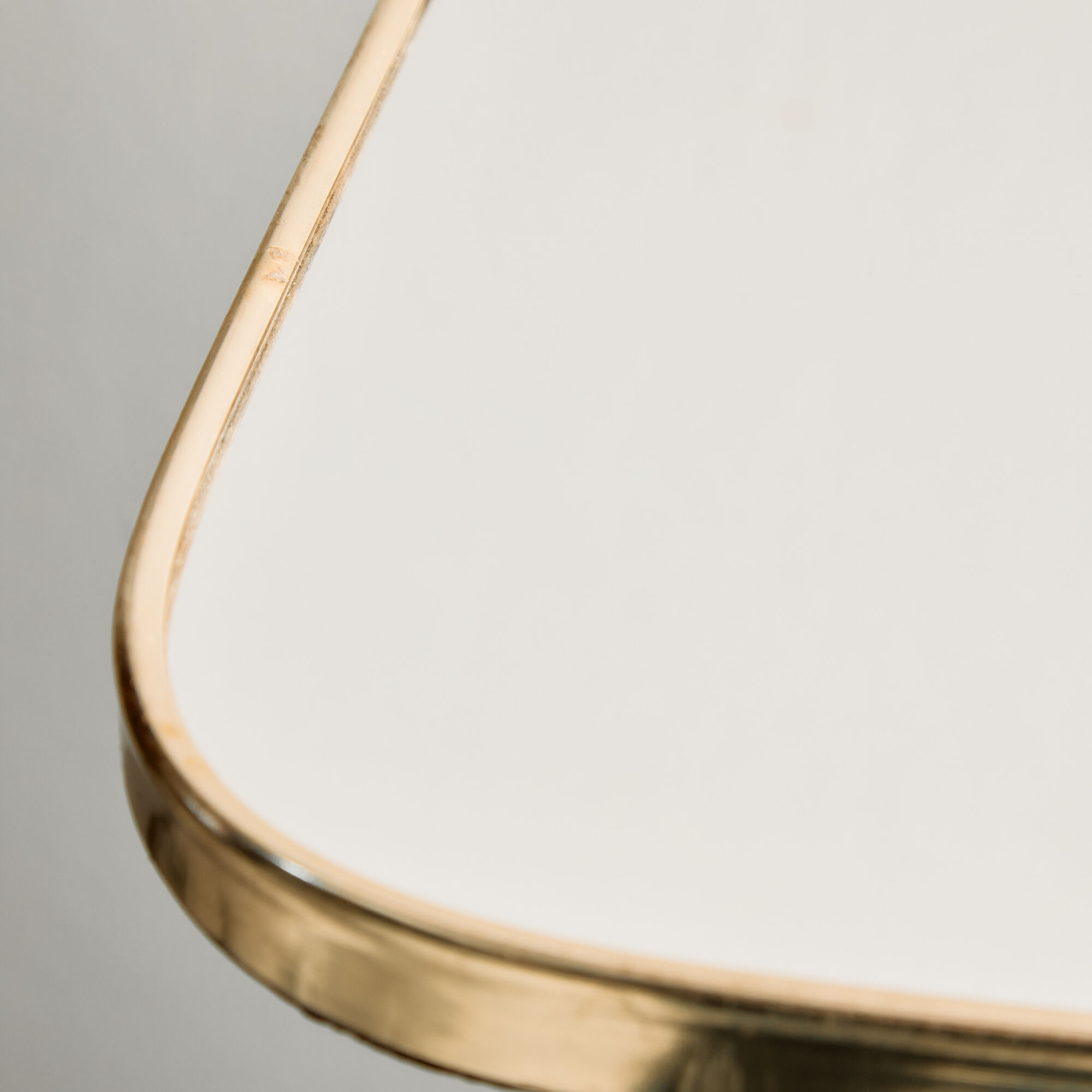 Framed metal mirror