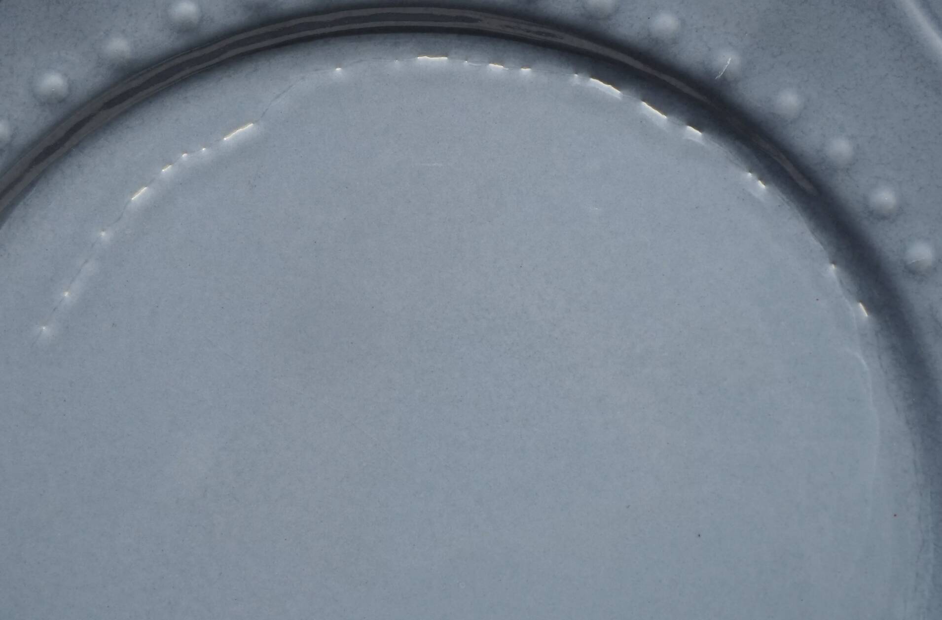 Set of 4 blue ceramic dessert plates.