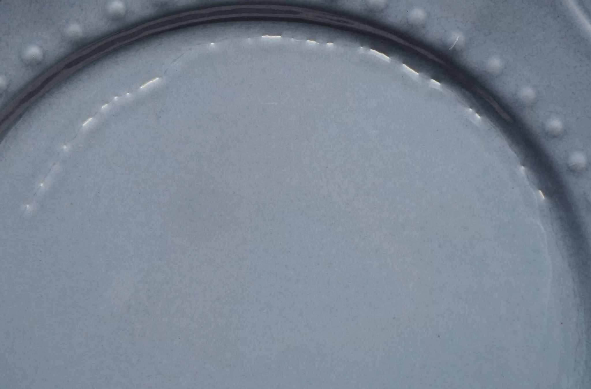 Set of 4 blue ceramic dessert plates.