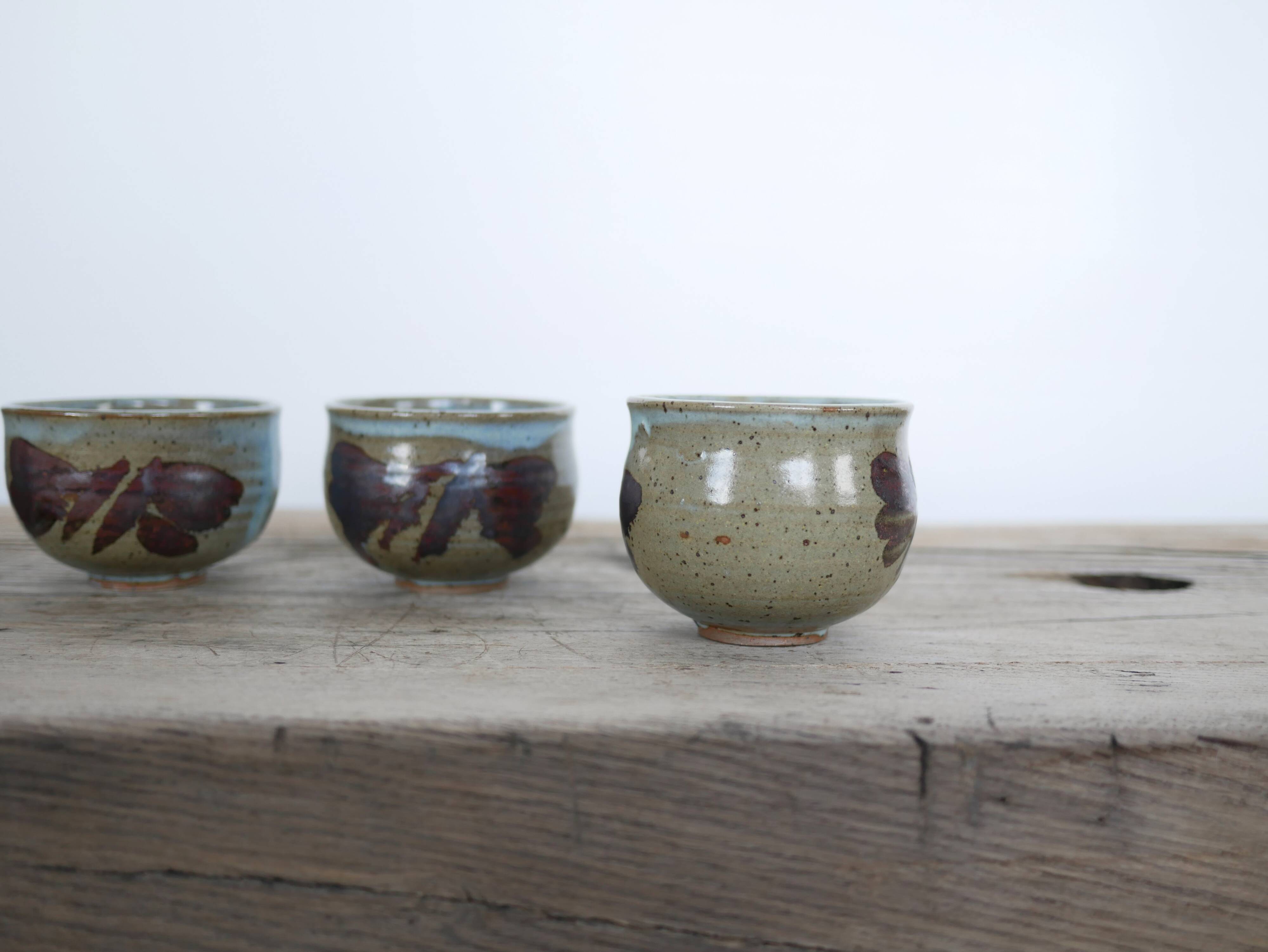 Series of 5 vintage stoneware cups