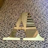 Golden brass sign vintage letter