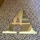 Golden brass sign vintage letter