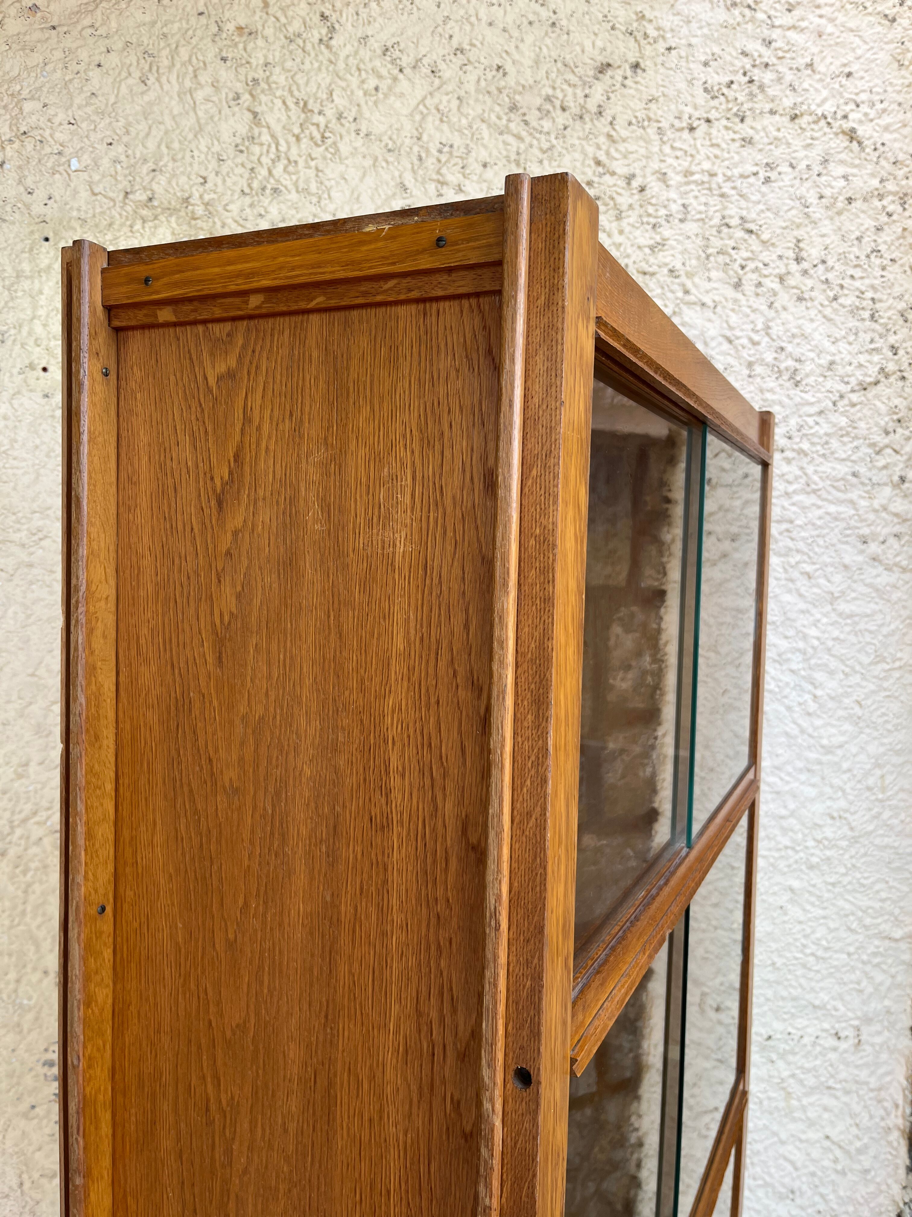 1950 oak glazed bookcase Émile SEIGNEUR