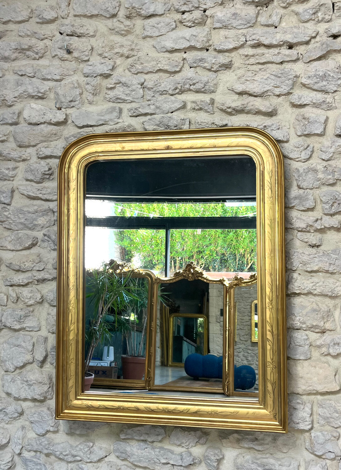 Antique mirror 86.5/69cm Louis-Philippe gilded with gold leaf, engraved decoration.