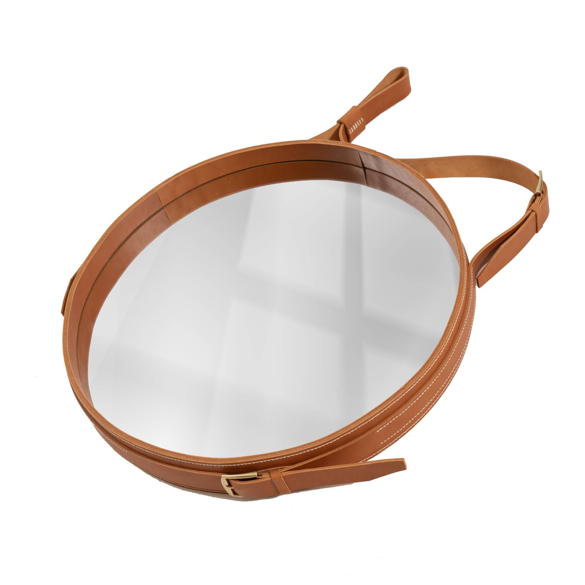 Handmade mirror in J. Adnet style, made of vegetable-tanned leather in tan colour, ø 45 cm.