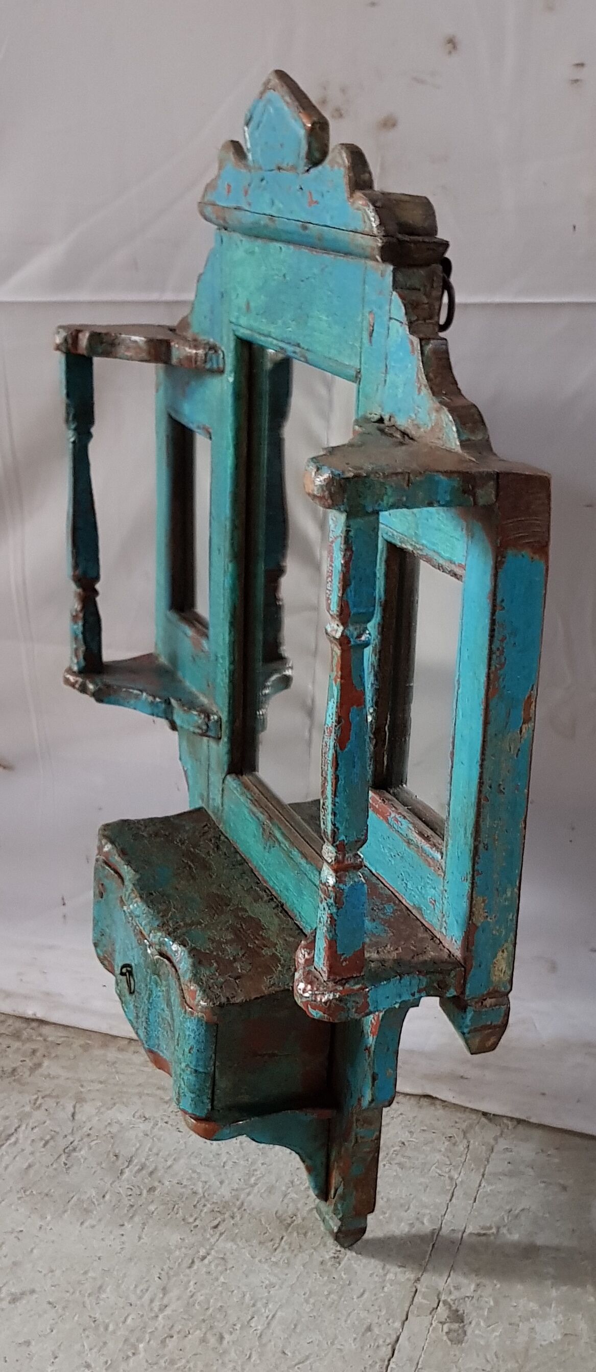 Old mirror-wall shelf in teak