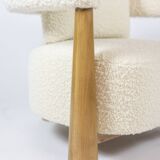 Pair of “bean” shaped armchairs, in blond beech. Contemporary work.