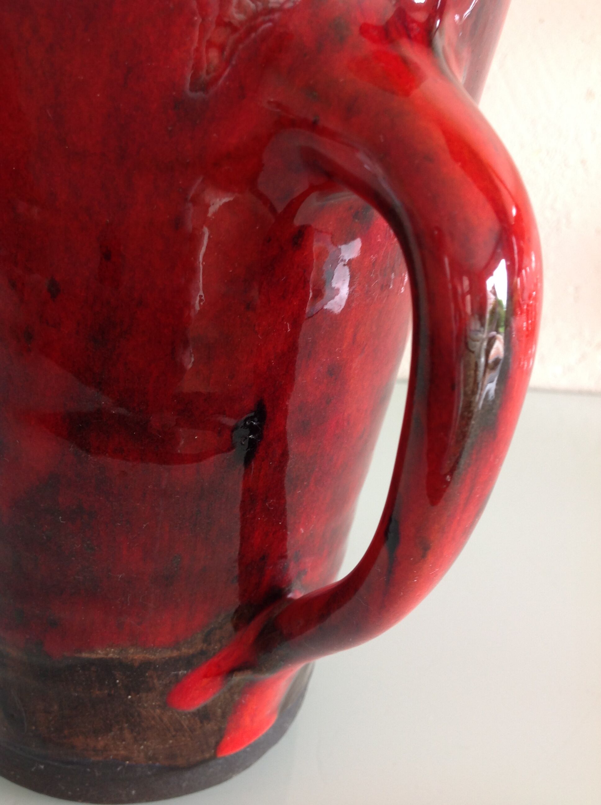 Pitcher in glazed red ceramic / vintag 60s-70s