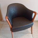 Pair of leather and wood armchairs in the Umberto Asnago style.