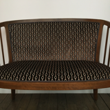 Old wooden and velvet bench