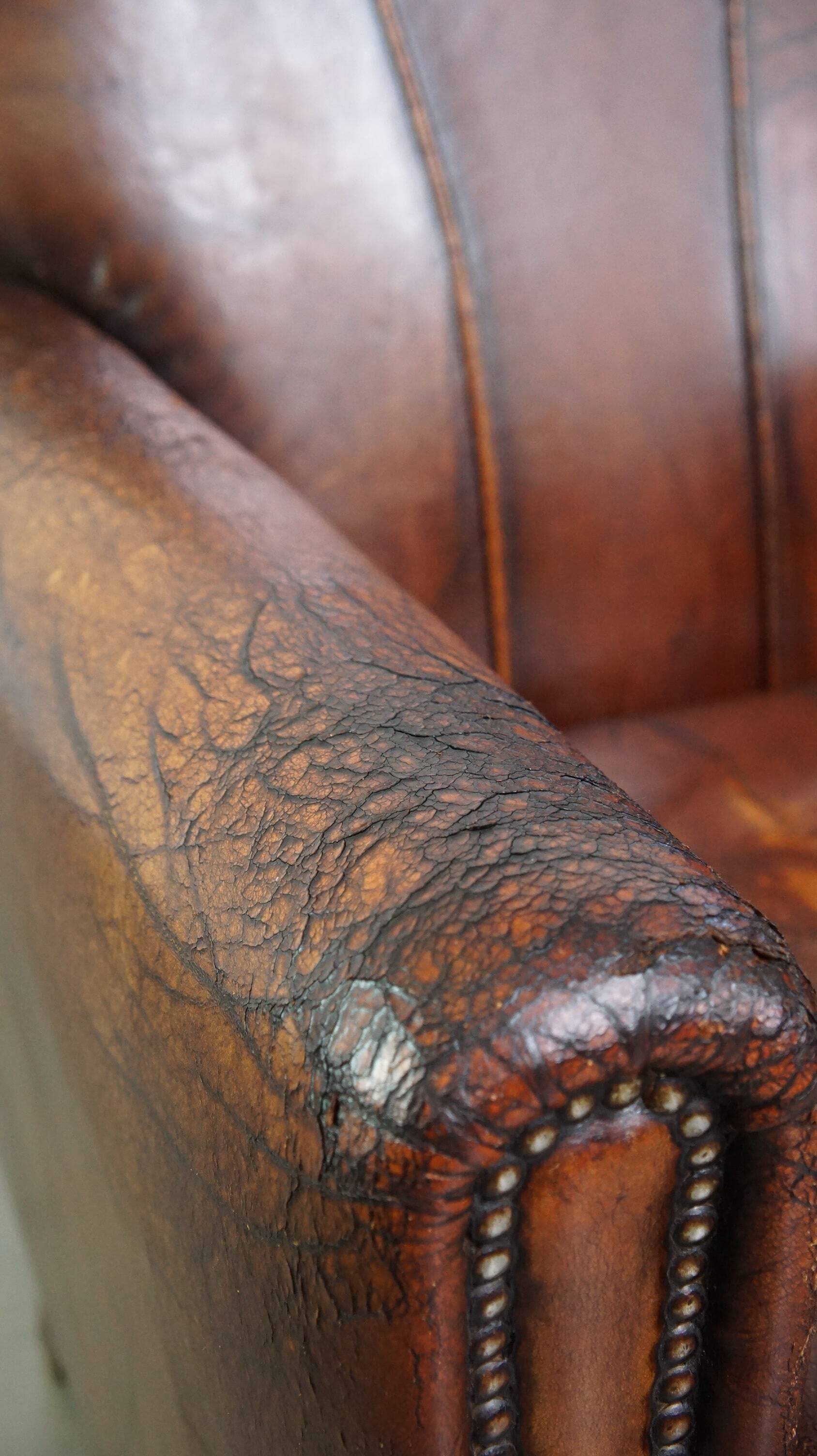 A vintage-style armchair with character, upholstered in beautifully patinated sheepskin.
