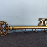 Key holder in the shape of a vintage key