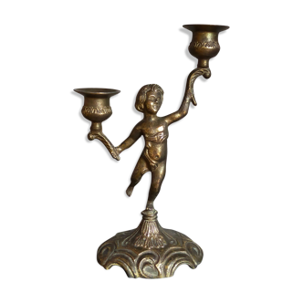 Old angel candle holder in two-armed regulator