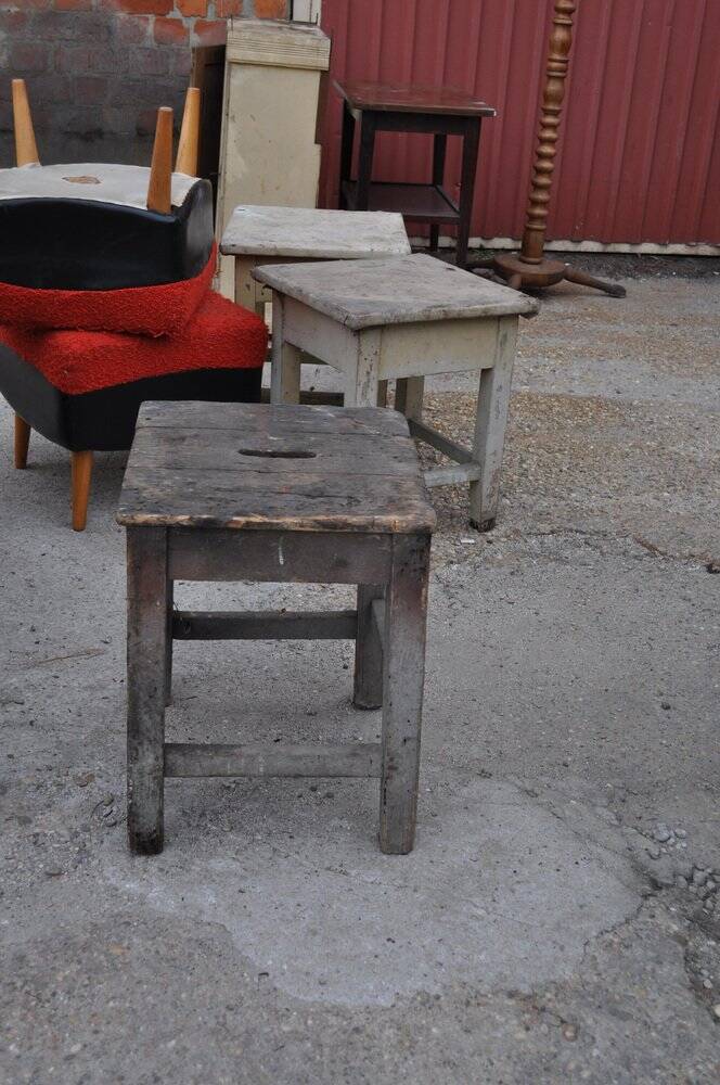 Vintage brown workshop stool in solid pine, 1940s industrial style.