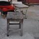 Vintage brown workshop stool in solid pine, 1940s industrial style.