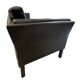 Black leather three-seater sofa