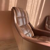 Pair of vintage armchairs in brown imitation leather
