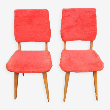 2 old red 'moumoute' chairs