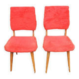 2 old red 'moumoute' chairs