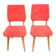 2 old red 'moumoute' chairs