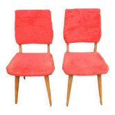 2 old red 'moumoute' chairs