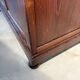 Antique wood and marble kitchen sideboard with carved backsplash