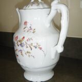 White porcelain teapot with small flowers