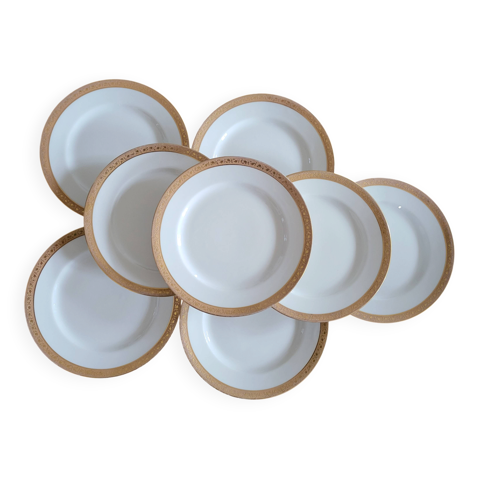 Lot of 8 small porcelain bread plates.