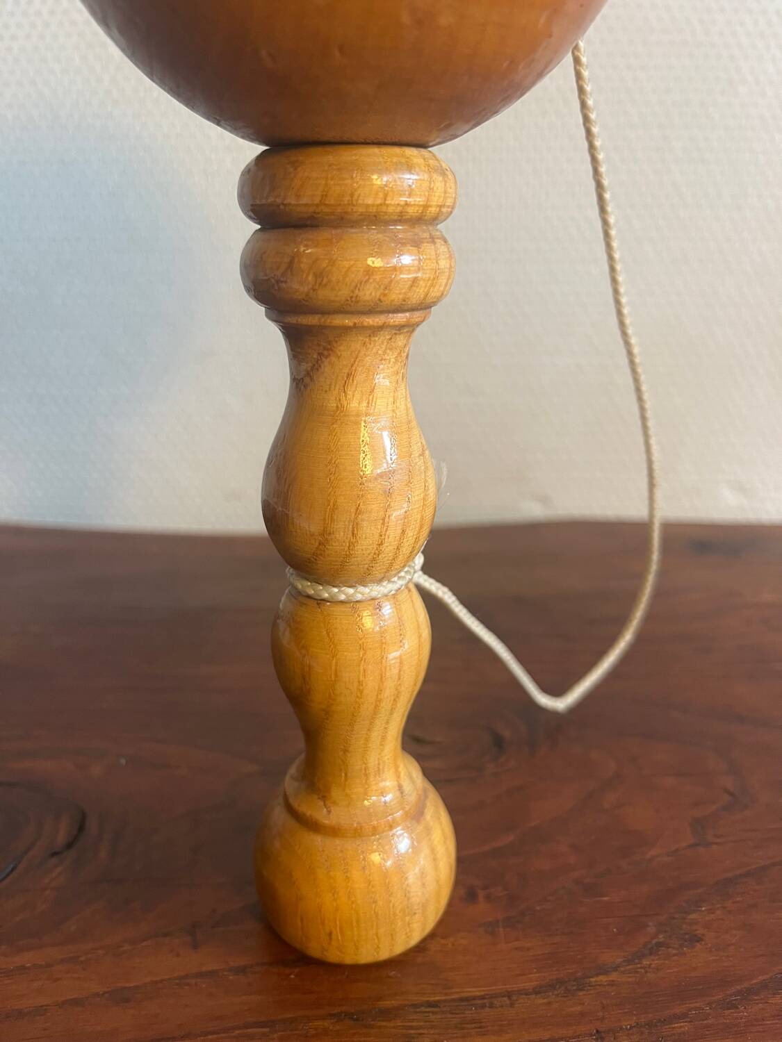 Wooden cup and ball game