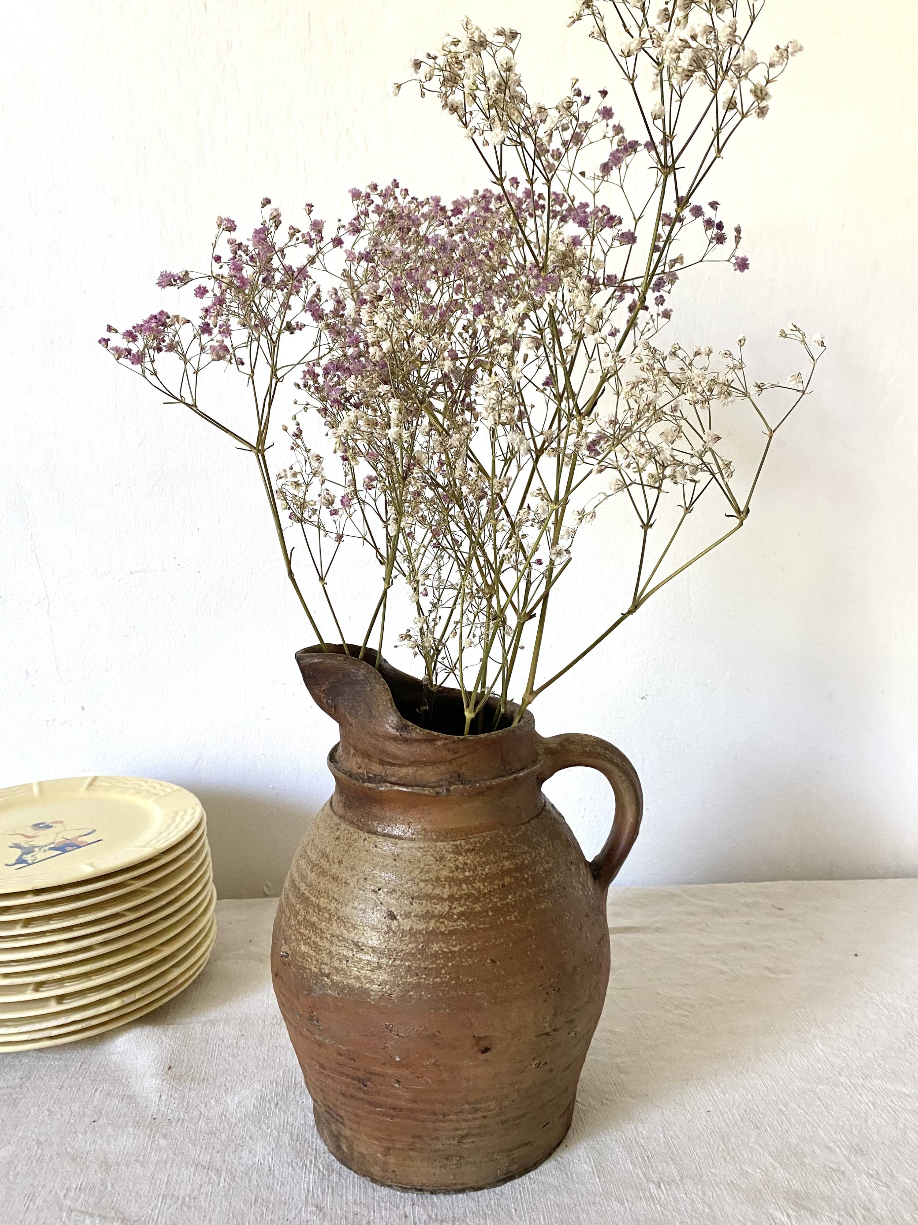 Antique terracotta pitcher