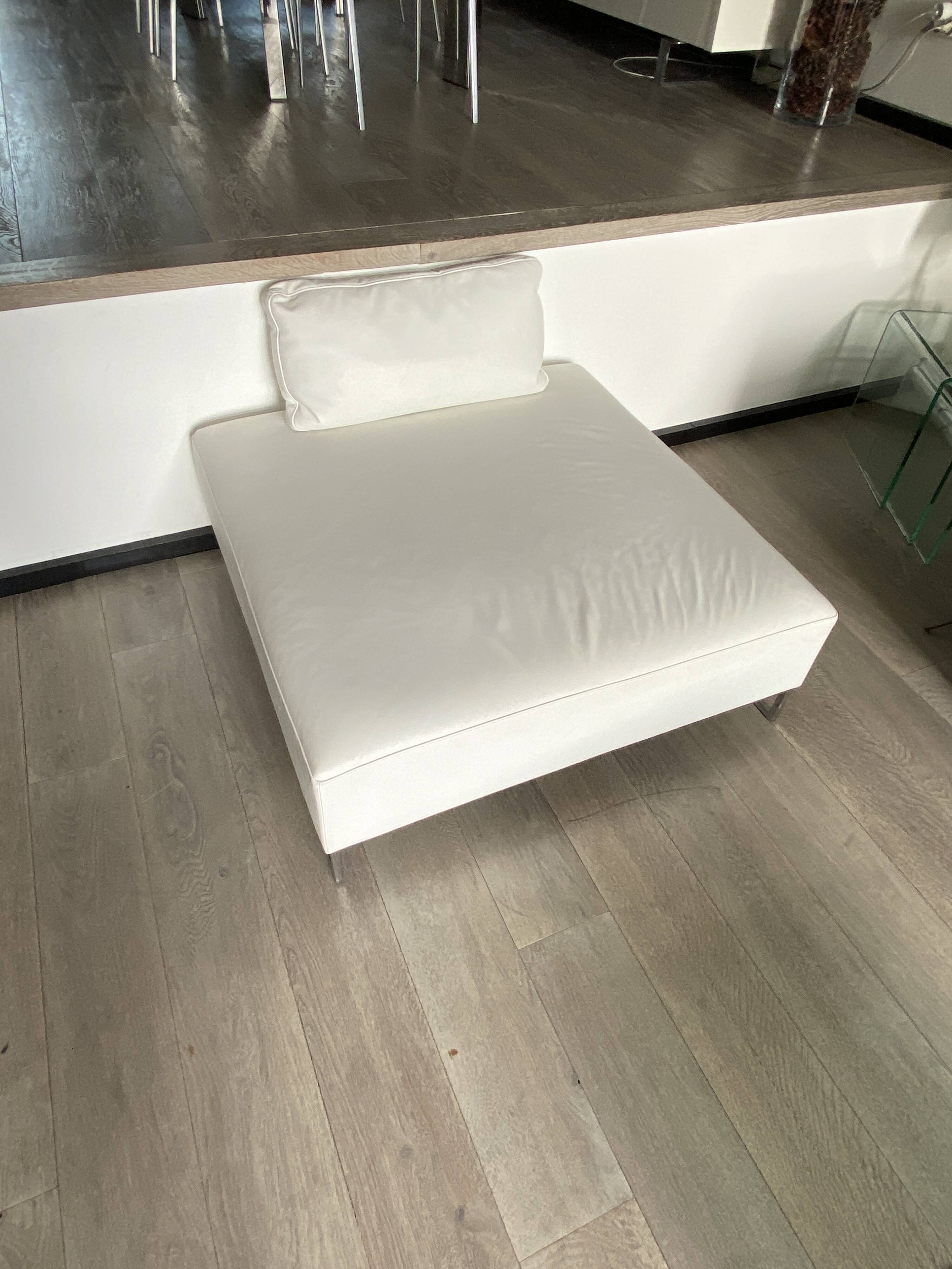 White leather pouf matching Ligne Roset sofa