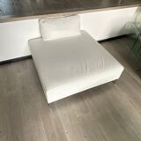 White leather pouf matching Ligne Roset sofa